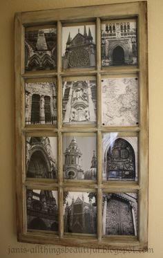 an old window is decorated with black and white pictures