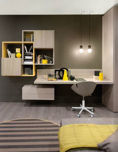 an office with yellow accents and gray walls