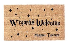 a welcome mat with the words wizard's welcome written in black ink on it