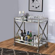 a bar cart filled with bottles and glasses