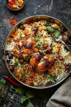 a bowl filled with rice, meat and vegetables