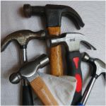 several different types of hammers and other tools on a white surface with text overlay