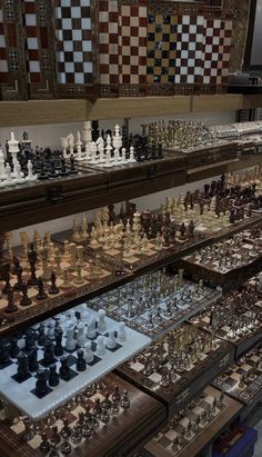 a large collection of chesss on display in a store