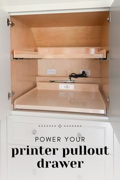 an open cabinet with the words power your printer pullout drawer on it's side