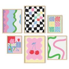 four framed art pieces in different shapes and sizes, each with a cherry on the top