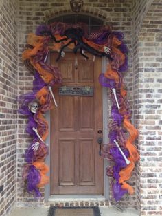 a door decorated with purple and orange decorations