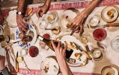 a group of people sitting at a dinner table