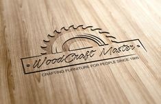 wood grain master logo on a wooden surface