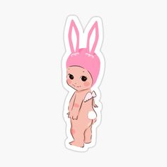 a sticker with an image of a baby bunny wearing a pink hat and sitting on the ground