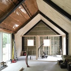 the inside of a house being built with wood framing