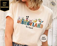 "Disneyland The Original Tshirt, Mickey Disneyland Shirt,Mickey and Friends Shirt,Disneyland Shirt,Disney Shirt  ORDERING: 1. Review all photos 2. Choose Size and Color from drop-down menu 3. If personalization box is available, add your text color 4. Add each shirt to cart one at a time 5. Click \"Add to Cart\" - you can go back to add more products 6. Click \"Proceed to Checkout\" 7. Add note to seller for any requests * We use several different brand shirts, all of them are premium quality and soft shirts. The brands we send may vary depending on our stock situation. * We guarantee 100% satisfaction. The brands we use in- clude premium quality shirt brands such as Bella Canvas, Gildan Soft Style, Circle, Outlash. BULK DISCOUNTS AND SPECIAL REQUESTS: We offer bulk discounts and are open Disneyland Shirts Christmas, Disneyland 2024, Winnie The Pooh Shirt, Disneyland Shirt, Disney Couple Shirts, Disney Christmas Shirts, Disney Halloween Shirts, Disney Pics, Disney Vacation Shirts