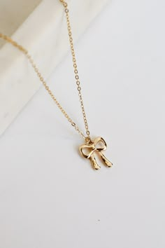 Andrea Gold Bow Charm Necklace Bow Necklace Aesthetic, Womens Necklaces Gold Jewelry, Aesthetic Jewelry Gold, Dainty Gold Necklace Stack, Hoco Jewelry Gold, Small Gold Jewelry, Cute Gold Necklace, Hoco Jewelry, Gold Jewellery Necklace