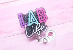 "Lab life badge reel: If you are looking for a unique gift then look no further! This retractable badge reel is perfect for any occasion.  Acrylic is 2\" Cord length 34\" You may choose a swivel clip, belt clip, lanyard, or carabiner. All badge reels come with dual lock fastener. They are interchangeable! Please do not allow children to play with the badge reels. Made in a smoke free studio. Don't hesitate to send me a message if you have questions. I will usually respond back within an hour fro Pct Badge Reels, Customizable Themed Badge Reel For Gift, Acrylic Badge Reels, Xray Tech Badge Reel, Science Badge Reel, Novelty Store, Badge Reels Diy, Black Retractable Badge Reel For Gift, Star Labs