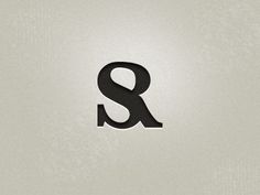 the letter s is made up of black letters on a light gray background, and it appears to be cut out from paper