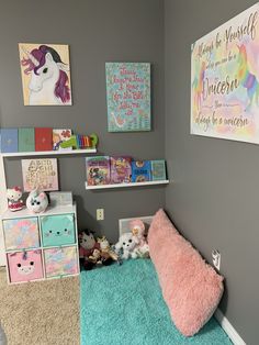 a child's bedroom decorated in pastel colors