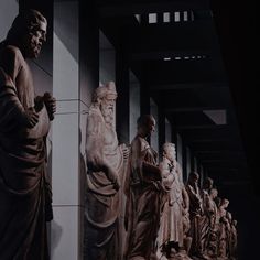 a group of statues sitting next to each other