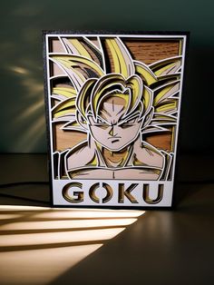 an image of goku on display in the sun with light coming from behind it