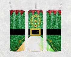 two green and red christmas candles with santa's hat on top, one is gold