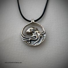 Octopus and waves double sided necklace. 925 silver. Very detailed on both sides. Comes with adjustable black cord. Made to order Waves Necklace, Octopus Necklace, Ocean Necklace, Wave Necklace, Silver Pendants, Octopus, Pendant Necklaces, Necklace Etsy, Jewelry Necklace Pendant