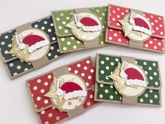 four christmas cards with santa's hat and polka dots on them, all in different colors