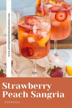 strawberry peach sangria cocktail in glasses with strawberries