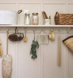 the shelves are filled with various items and baskets on them, along with other things