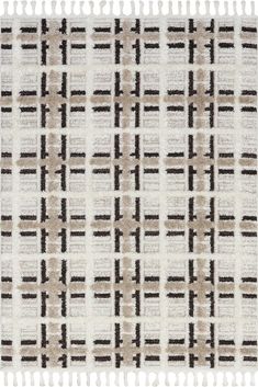 a white and black rug with fringes on it's edges, in the shape of squares