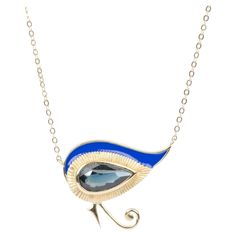 ♥ Eye of Horus Pear Shaped Sapphire 14K Yellow Gold Necklace with bright blue enamel ♥ The item measures 19.2mm in length, 23mm in width, and stands 3.5mm from the finger. The necklace is 17"" long with a slider bead to allow free adjustment. ♥ Gemstone: Sapphire, 1.82ct ♥ All stone(s) used are genuine, earth-mined, and guaranteed conflict free! As is with anything that is naturally occurring, our gemstones or pearls will have imperfections, e.g. inclusions in the gemstones, unevenness in the pe 14k Yellow Gold Necklace, Yellow Gold Necklace, Eye Of Horus, Enamel Necklaces, Bright Blue, Pear Shaped, Chains Necklace, Blue Sapphire, Turquoise Necklace