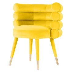 an upholstered yellow chair with metal legs and four round holes on the back