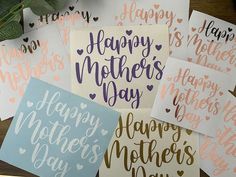 six handmade mothers day cards sitting on top of a table