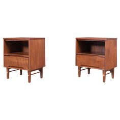 two wooden nightstands side by side against a white background