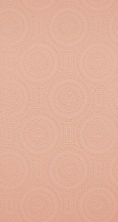 an orange and pink wallpaper with circular designs on it's surface, as well as the bottom half