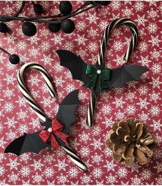 some candy canes and decorations on a table