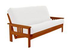 a wooden futon with white sheets on it