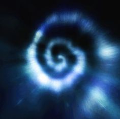 an image of a blue spiral in the dark