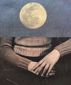 a person sitting down with their hands folded out in front of the moon above them