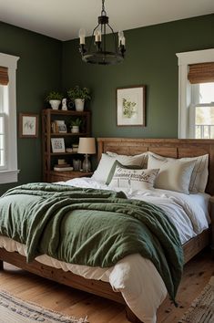 a bedroom with green walls and white bedding