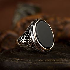 Onyx Black Flat Silver Ring For Men. Handmade in 925 sterling silver with agate stone. On the ring Oval flat black aqeeq - agate, onyx stone settled. Covered with yellow color rhodium plated frame. No gold or gold plating settled. Dimensions of stone is 20 mm x 15 mm. Average weight of Onyx Black Flat Silver Ring is 14 gr. (depends your ring size). Back side is closed. Classic and exclusive style. Stone Type Onyx, Aqeeq - Agate Stone Color: Black Stone Dimensions: 20 mm x 15 mm Stone Shape: Oval Retro Style Men, Black Agate Ring, Detailed Ring, Black Jewelry, Agate Ring, Onyx Ring, Affordable Jewelry, Men's Jewelry Rings, Color Ring