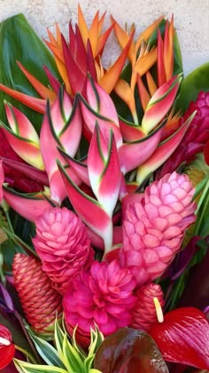 a bunch of flowers that are sitting on a table