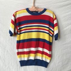 amazingly cute striped primary color knit acrylic top.  unisex  size medium  measurements laying flat and unstretched  18" across shoulders 17" under wrap pits 21" length Color Blouse, Knit Short, Pullover Sweater Women, Knit Shorts, Vintage Knitting, Short Sleeved Sweaters, Red Blouses, Women Pullover, Yellow Blue