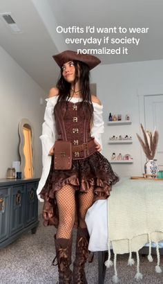 a woman in a pirate costume is posing for the camera