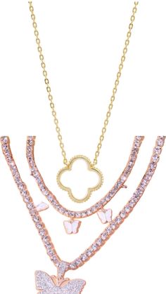 three layered necklaces with butterflies on them