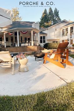 an outdoor patio with chairs and tables in front of the house that is for sale