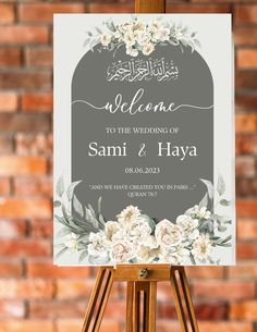 an easel with a sign that says welcome to the wedding of sami and haya