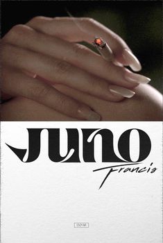 the poster for juno shows two hands holding each other's fingers, with an orange ring