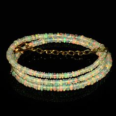 Natural Ethiopian Opal Beads Necklace| AAA+ Opal Beads Necklace| Welo Fire Opal Beads Necklace| Ethiopian Opal Beads| 16 Inch| Gift For Her Gemstone Type                 : 100 % Confidence   Item Code                           :   A-8758 Origin                                 -:100% Natural Ethiopian Opal Necklace Grade                                  -:  AAA++ Stone shape                       -: Smooth Rondelle Beads Stone color                         -: Same As Picture Metal-: Length-                                  : 16 Inch Quantity-                               :   1 Stand                           Size Of Necklace                 :  2.5 - 4.5 MM  Weight Of Necklace            :  34.80 Carat ( Approx)    Quantity  :    1 piece 100% Genuine & Natural ABOUT US  based in Jaipur, Ind Ethiopian Opal Necklace, Opal Beads, Opal Necklace, Beads Necklace, Ethiopian Opal, Last Minute Gifts, Fire Opal, Jaipur, Semiprecious Stones