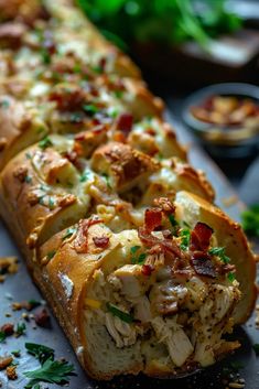 the bread is filled with meat, cheese and other toppings as well as parsley