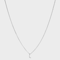 Enjoy a simple yet elegant look by accessorizing with the Sterling Silver Small Polished Initial Pendant Necklace from A New Day™. This silver-tone small pendant necklace features a cable chain with an initial dangling down at the center for a beautiful look. Complete with a pouch for convenient storage or gifting, this initial pendant necklace closes with a spring ring clasp closure and comes with an extender chain for a perfect fit around the neck. A New Day™: Style that goes wherever you do. Silver Dainty Initial Necklace For Formal Occasion, Classic Silver Initial Necklace With Delicate Chain, Classic Silver Name Necklace With Delicate Chain, Classic Sterling Silver Initial Necklace With Delicate Chain, Classic White Gold Initial Necklace For Everyday, Classic Silver Initial Necklace With Adjustable Chain, School Wishlist, J Necklace, Target Gifts