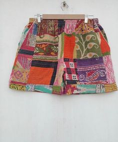 "Indian vintage handmade kantha pants cotton fabric Hand stitching. This Vintage Throw Kantha pant is made of 100% Old Cotton Recycled Fabric with three layers of sarees together with thousands of small and delicate Fine Kantha stitches, Hand crafted softly quilted by artisans in India.The way in which the stitches have been done makes the pant extraordinary. It has different beautiful warm and charming colors, designs and patterns. Size :- M Size : Length: 16\" (40 cms.) Waist: 26\" ( 65 cms) A Handmade Cotton Bottoms For Summer, Handmade Cotton Beach Bottoms, Handmade Cotton Bottoms For Festival, Handmade Cotton Festival Bottoms, Cotton Patchwork Shorts For Vacation, Patchwork Cotton Shorts For Vacation, Bohemian Patchwork Shorts, Traditional Cotton Shorts For Summer, Multicolor Patchwork Shorts For Vacation