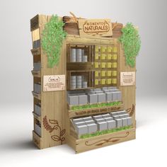 a wooden display case filled with lots of boxes and plants next to a sign that says montesso's naturals